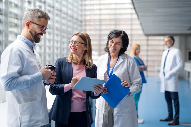 female-european-adult-business-talking-with-doctors-print